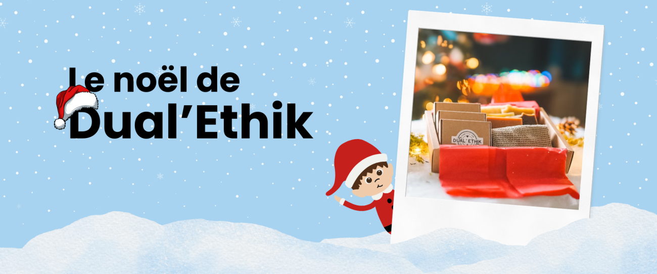 Bannière Le noel de dual'ethik, Il y a un bonnet de Noël sur le D de Dual'Ethik et un petit lutin qui se cache un peu derrière une photo d'un coffret