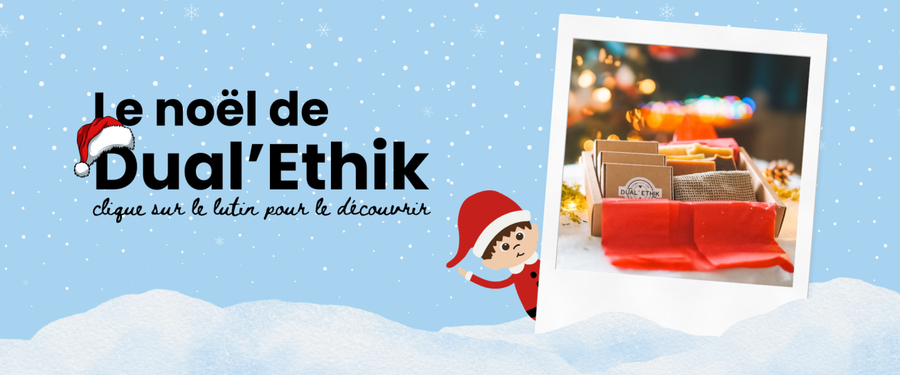 Bannière Le noel de dual'ethik, Il y a un bonnet de Noël sur le D de Dual'Ethik et un petit lutin qui se cache un peu derrière une photo d'un coffret